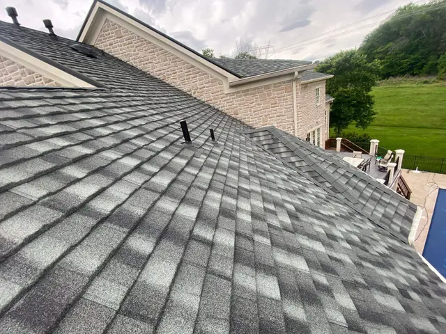 Close view of gray architectural asphalt shingles